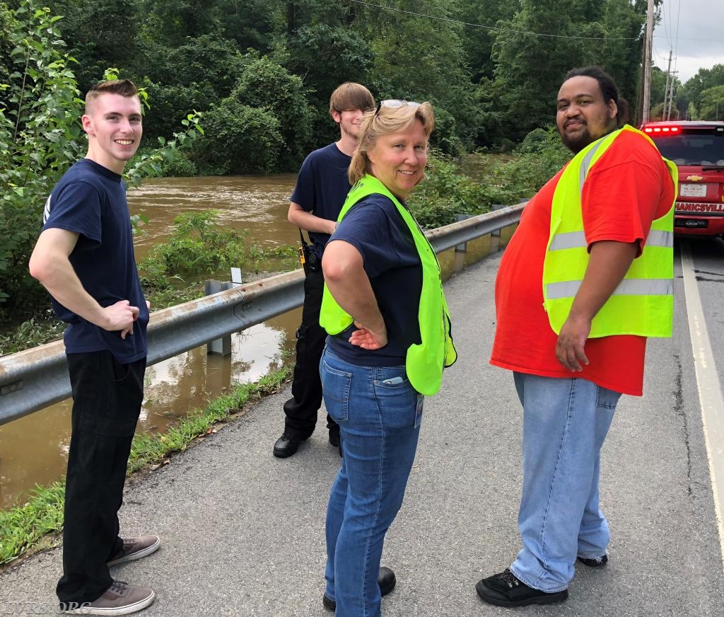 Collin, Tyler, Carol and Tim standing by at a water rescue.