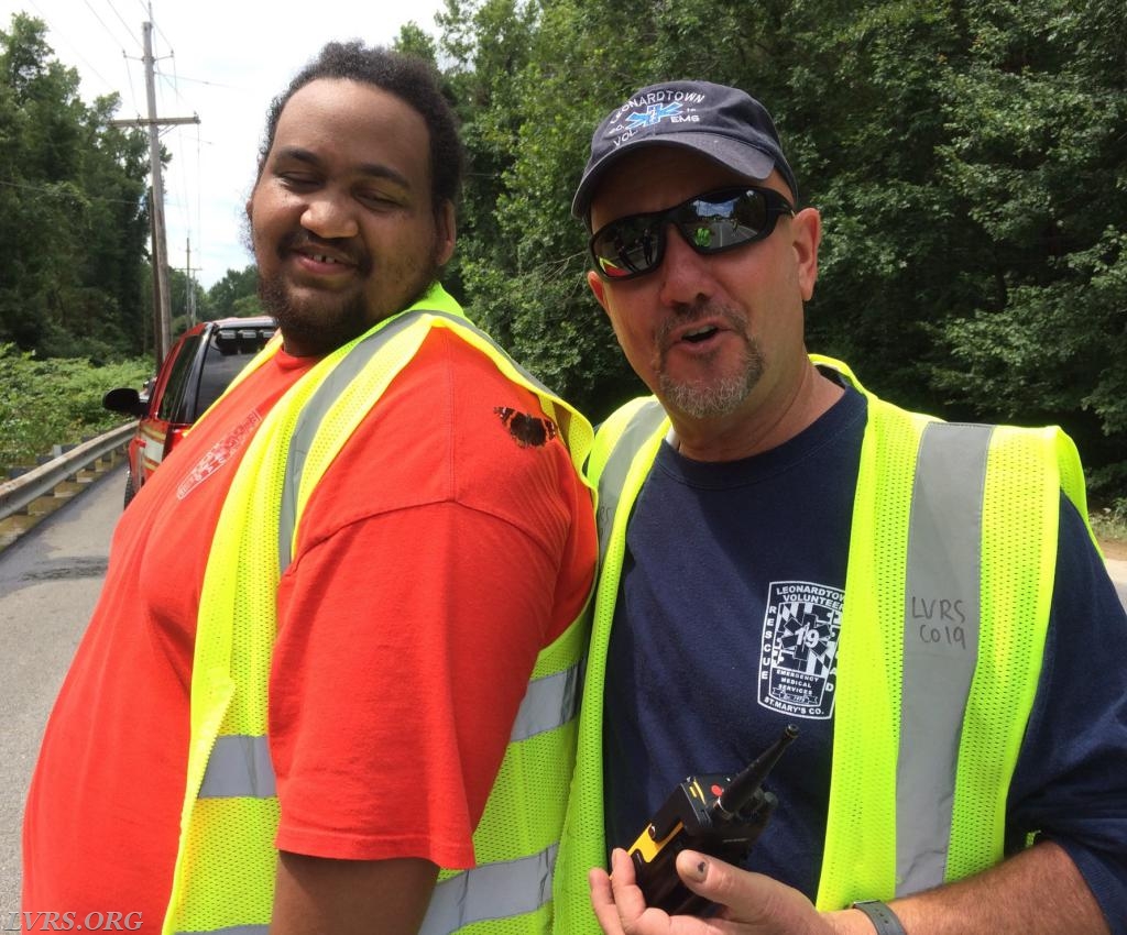 Tim and Jake standing by at a water rescue.