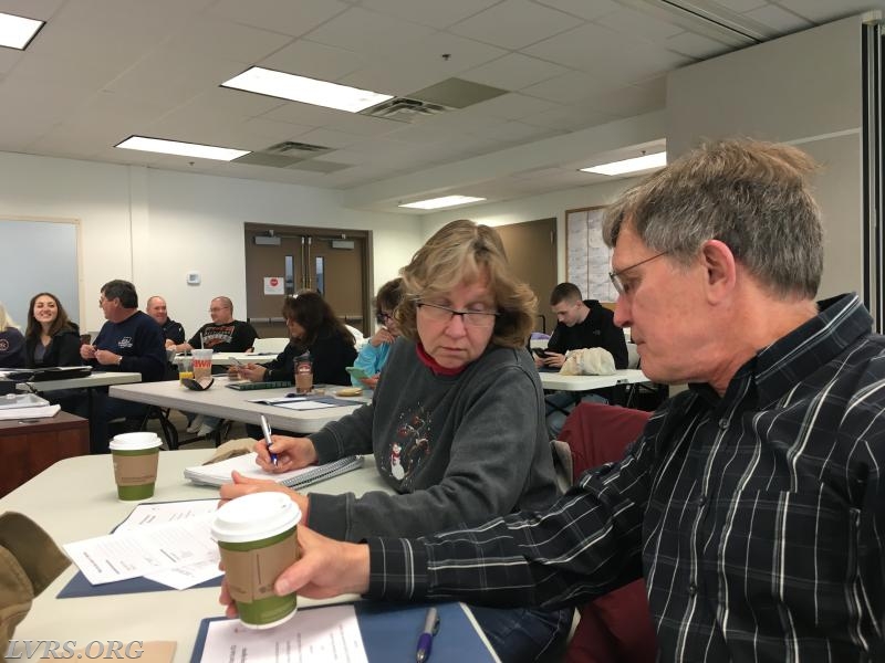 Carol and Larry in class.